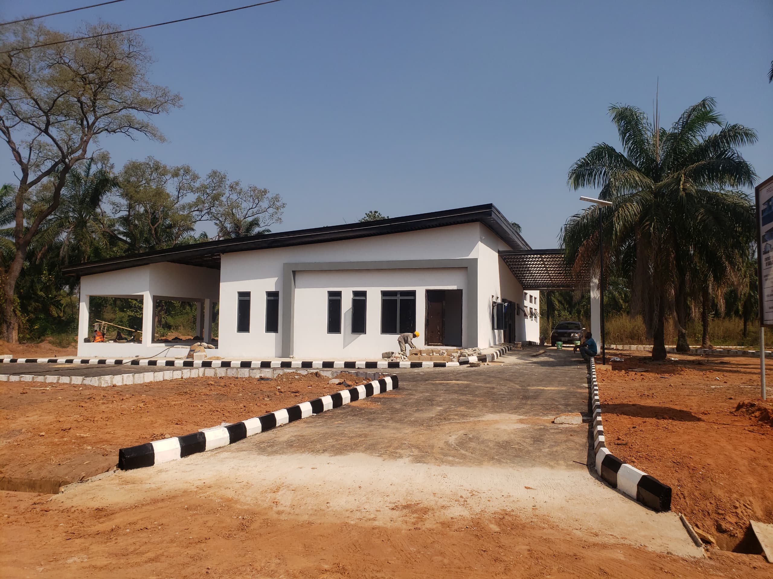 Completed white bungalow building on site